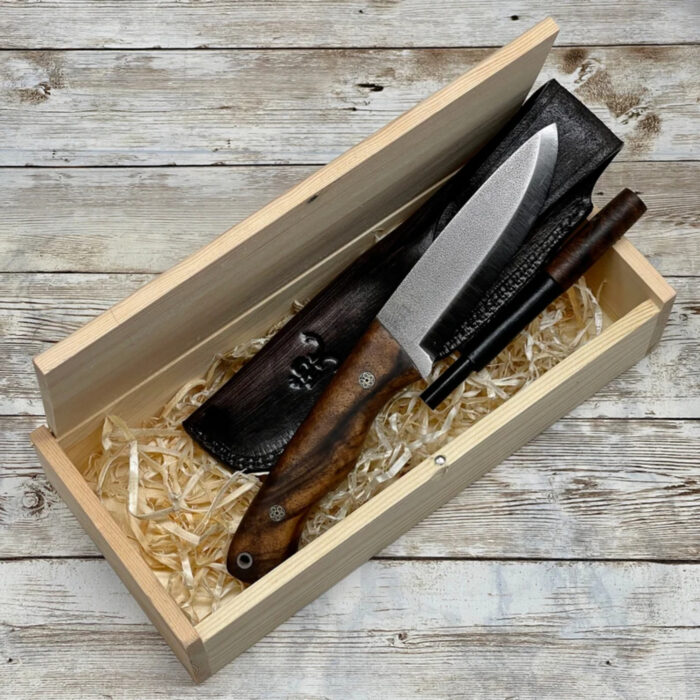 Rustic outdoor camping knife with a durable wooden handle, perfect for wilderness adventures and outdoor activities.